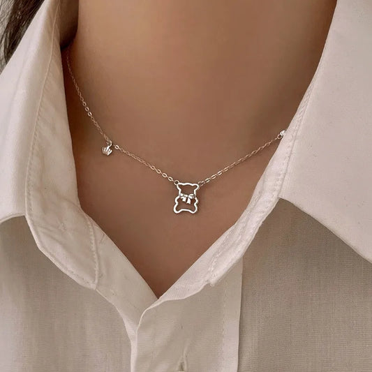 Sterling Silver Bear Necklaces worn to showcase its length and pendant detail