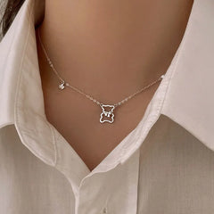 Sterling Silver Bear Necklaces worn to showcase its length and pendant detail