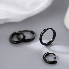 Angled view of the Sterling Silver Black Small Hoop Earrings