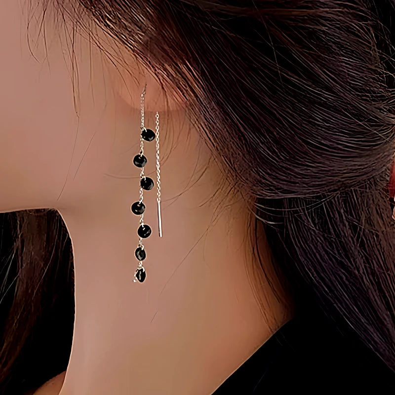 Close-up detail of the sparkling zircons and plating on the Spike Threader Earrings