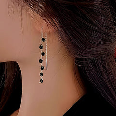 Close-up detail of the sparkling zircons and plating on the Spike Threader Earrings