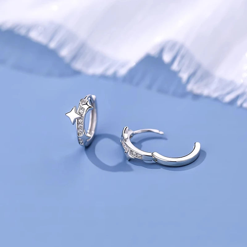 Angled view of the Sterling Silver Bling Star Hoop Earrings