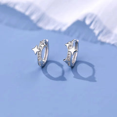 Close-up detail of the sparkling zircons and plating on the Star Hoop Earrings