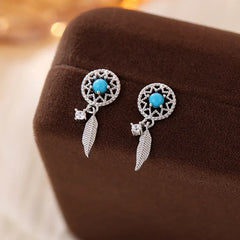 Close-up detail of the sparkling zircons and plating on the Blue Bead Earrings