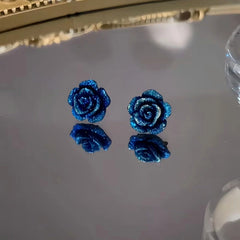 Close-up detail of the sparkling zircons and plating on the Blue Rose Studs