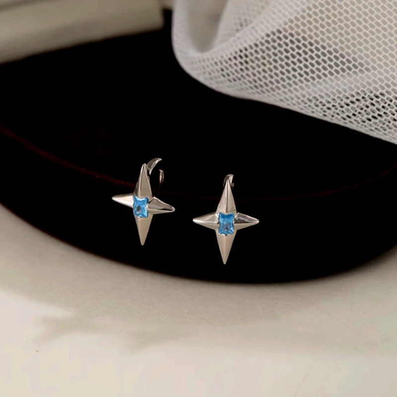Close-up detail of the sparkling zircons and plating on the Star Ear Hooks