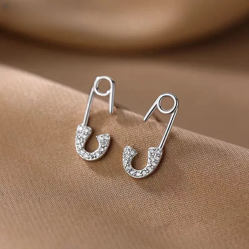 Angled view of the Sterling Silver Buckle Stud Earrings