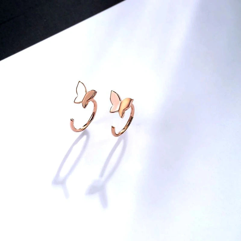 Close-up detail of the sparkling zircons and plating on the Butterfly Ear Hooks