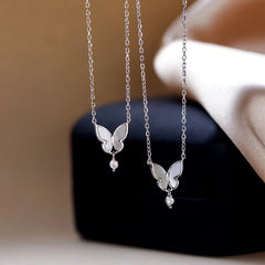 Sterling Silver Butterfly Necklace worn to showcase its length and pendant detail