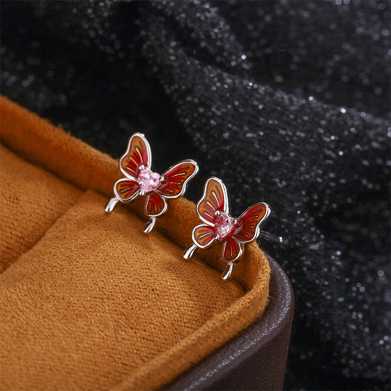 Close-up detail of the sparkling zircons and plating on the Butterfly Stud Earrings