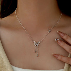 Close-up of the pendant and clasp on the Butterfly Tassel Necklace
