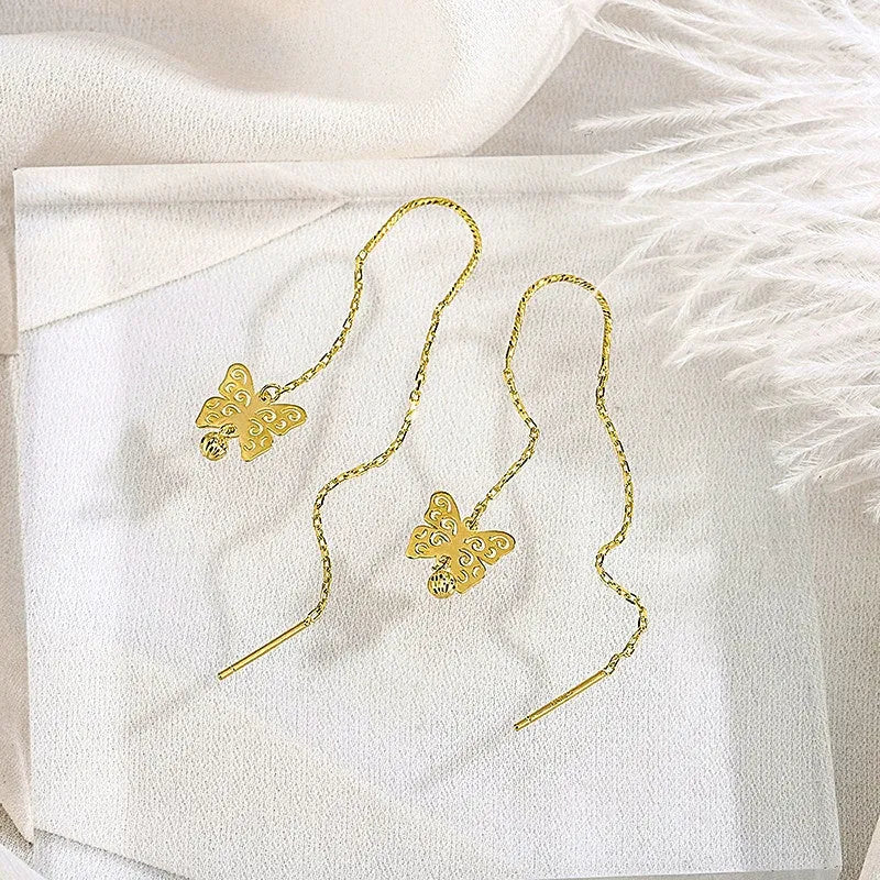 Angled view of the Sterling Silver Butterfly Threader Earrings