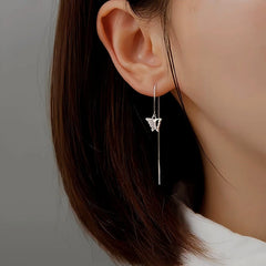 Model showcasing the dangle and style of the Sterling Silver Butterfly Threader Earrings