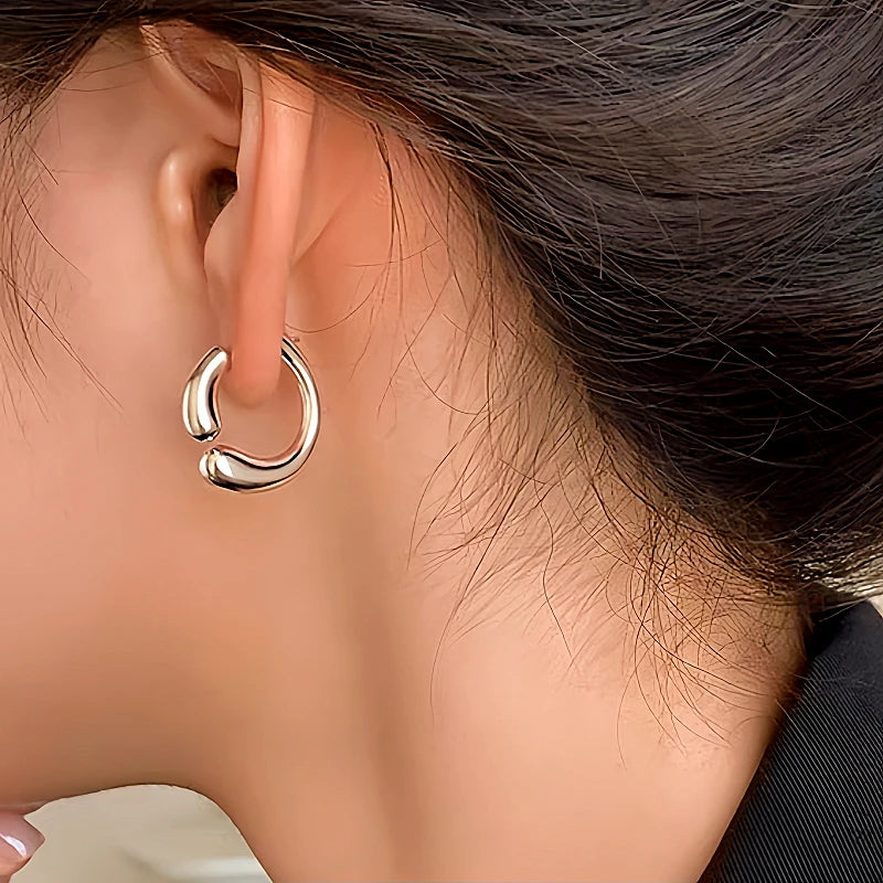 Close-up detail of the sparkling zircons and plating on the C-Shaped Threader Earrings