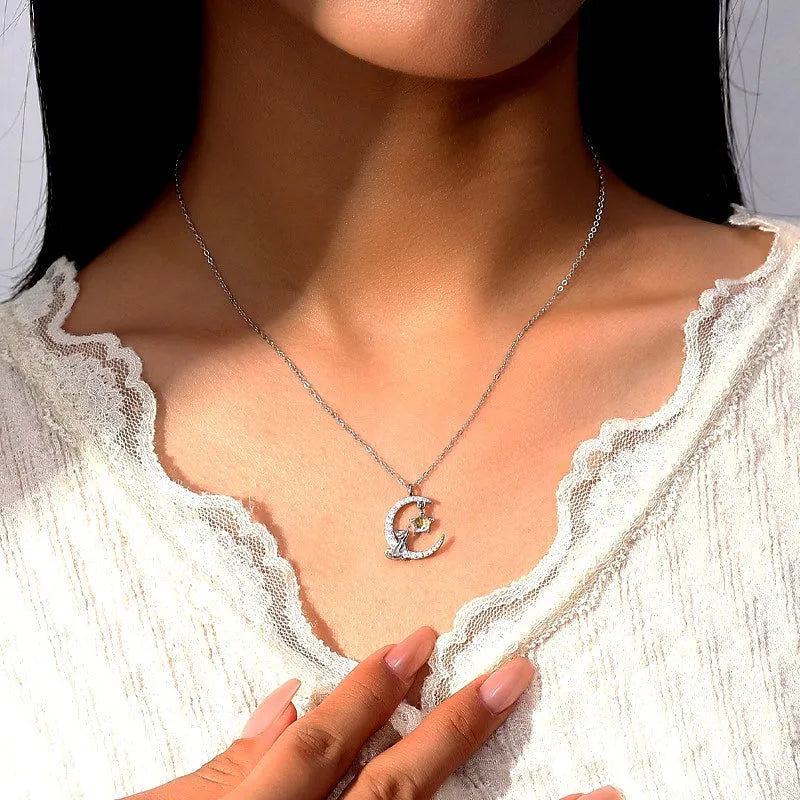 Sterling Silver Cat And Moon Necklace worn to showcase its length and pendant detail