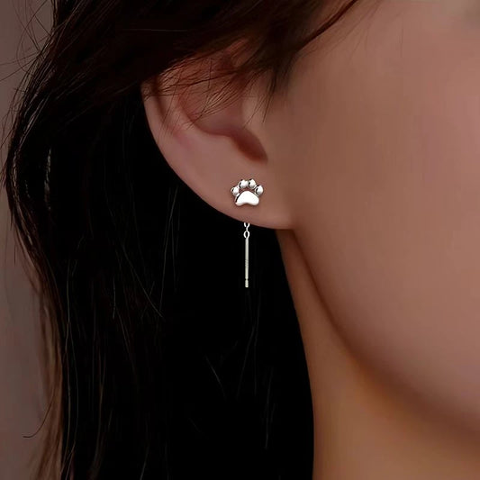 Model showcasing the dangle and style of the Sterling Silver Cat Claw Threader Earrings