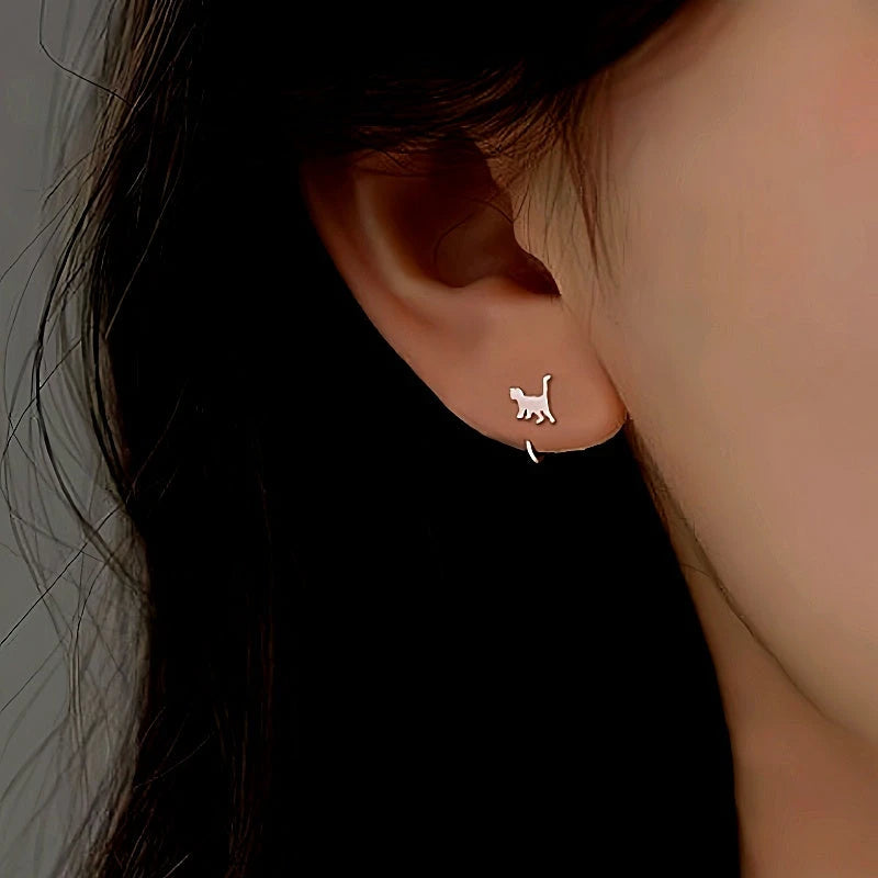 Model showcasing the dangle and style of the Sterling Silver Cat Ear Hook Earrings