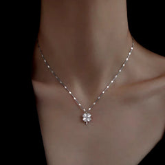 Close-up of the pendant and clasp on the Stone Flower Necklace