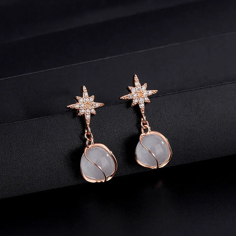 Close-up detail of the sparkling zircons and plating on the Star Earrings