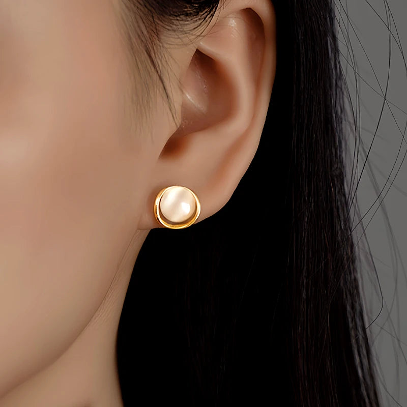 Angled view of the Sterling Silver Cat's Eye Stud Earrings