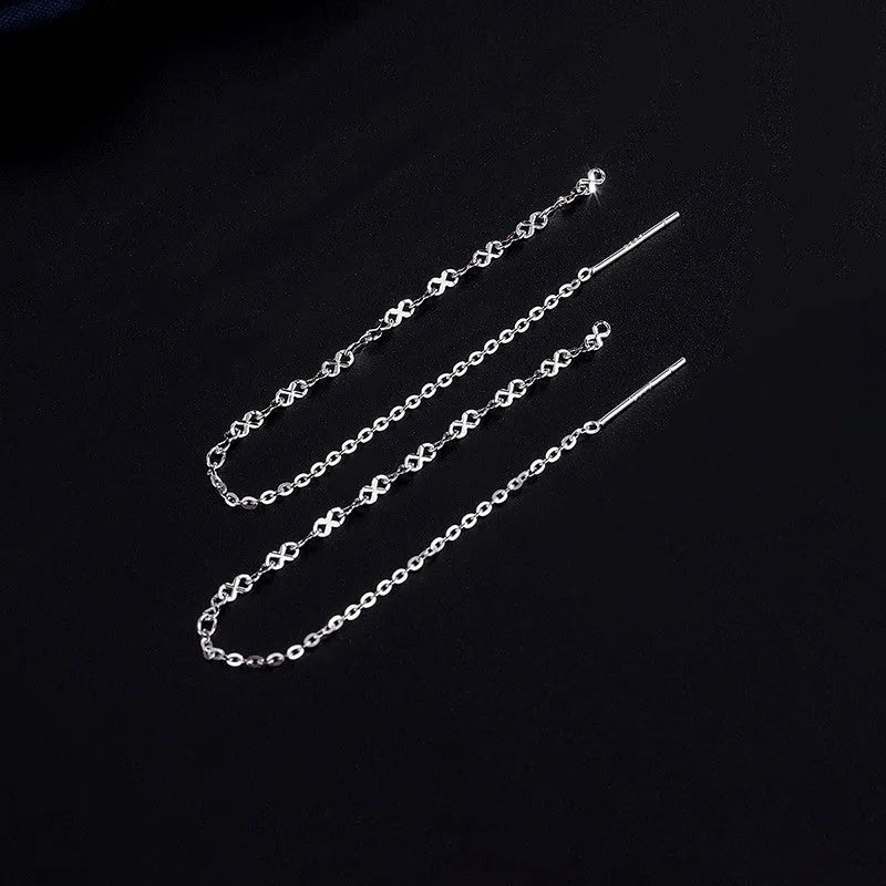 Close-up detail of the sparkling zircons and plating on the Chain Threader Earrings