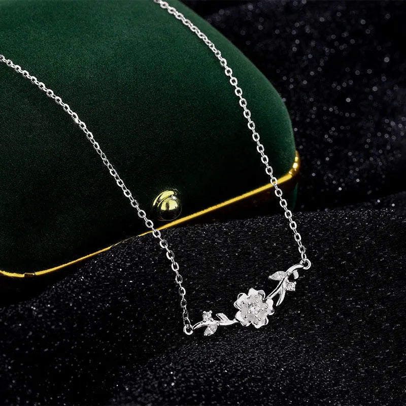 Detailed view of the Sterling Silver Cherry Blossom Necklace chain and pendant