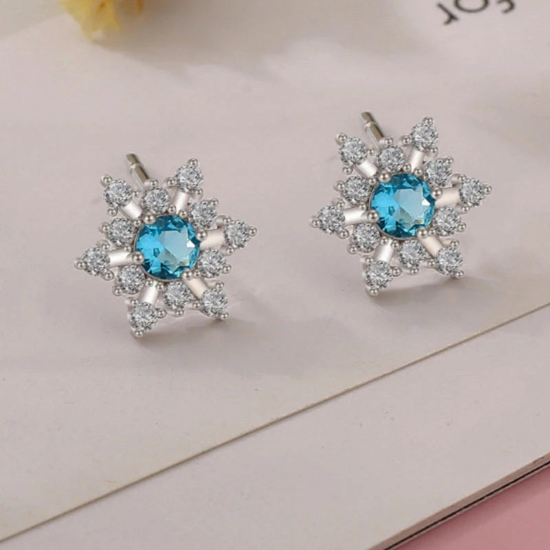 Close-up detail of the sparkling zircons and plating on the Snowflake Stud Earrings