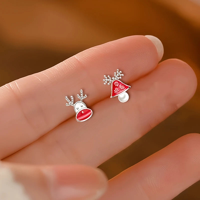 Model showcasing the dangle and style of the Sterling Silver Christmas Deer Bell Earrings