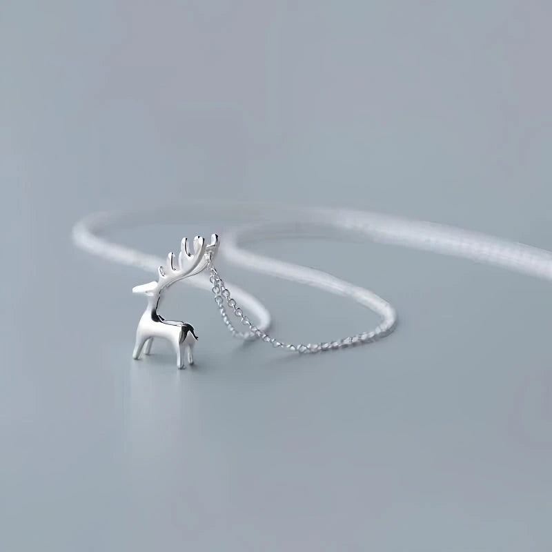 Sterling Silver Christmas Elk Pendant Necklace worn to showcase its length and pendant detail