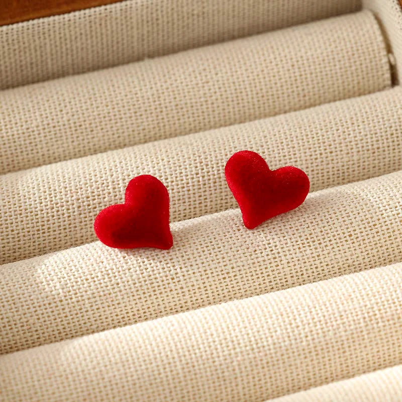 Close-up detail of the sparkling zircons and plating on the Heart-Design Studs