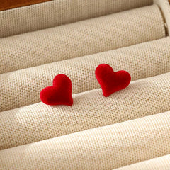 Close-up detail of the sparkling zircons and plating on the Heart-Design Studs