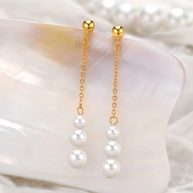 Close-up detail of the sparkling zircons and plating on the Pearl Tassel Earrings