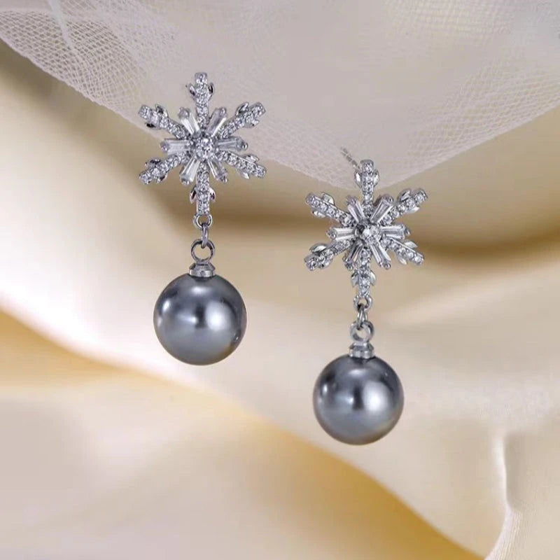 Close-up detail of the sparkling zircons and plating on the Snowflake Pearl Earrings