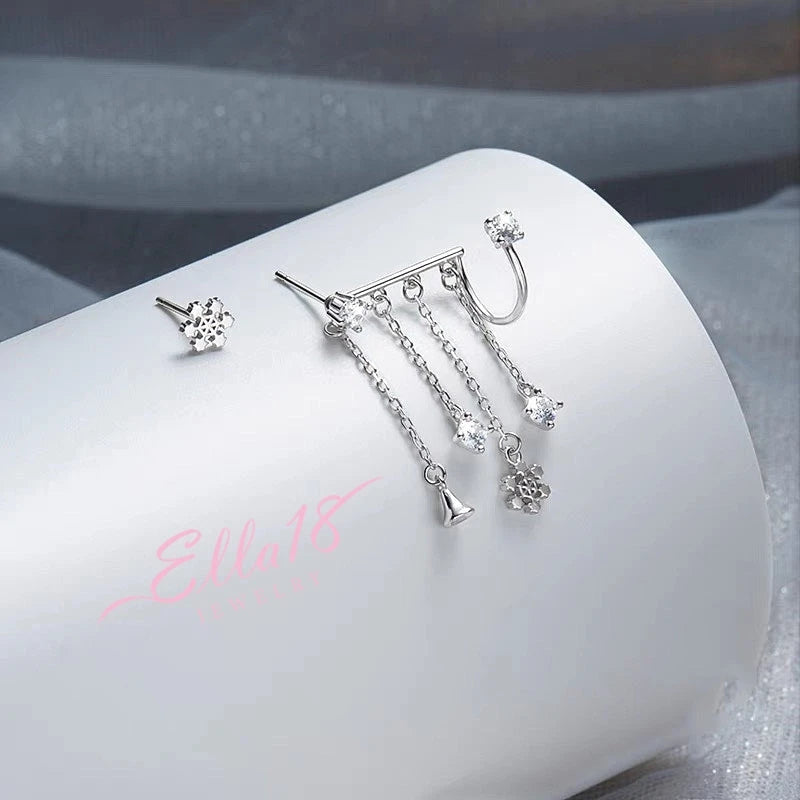 Close-up detail of the sparkling zircons and plating on the Asymmetrical Snowflake Earrings