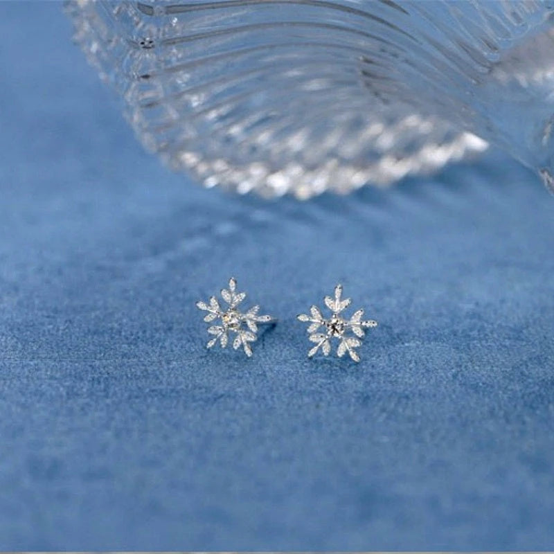 Close-up detail of the sparkling zircons and plating on the Snowflake Stud Earrings