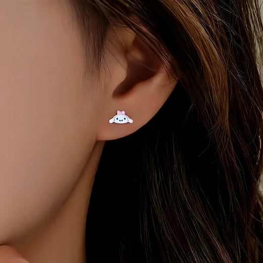 Model showcasing the dangle and style of the Sterling Silver Cinnamon Dog Stud Earrings