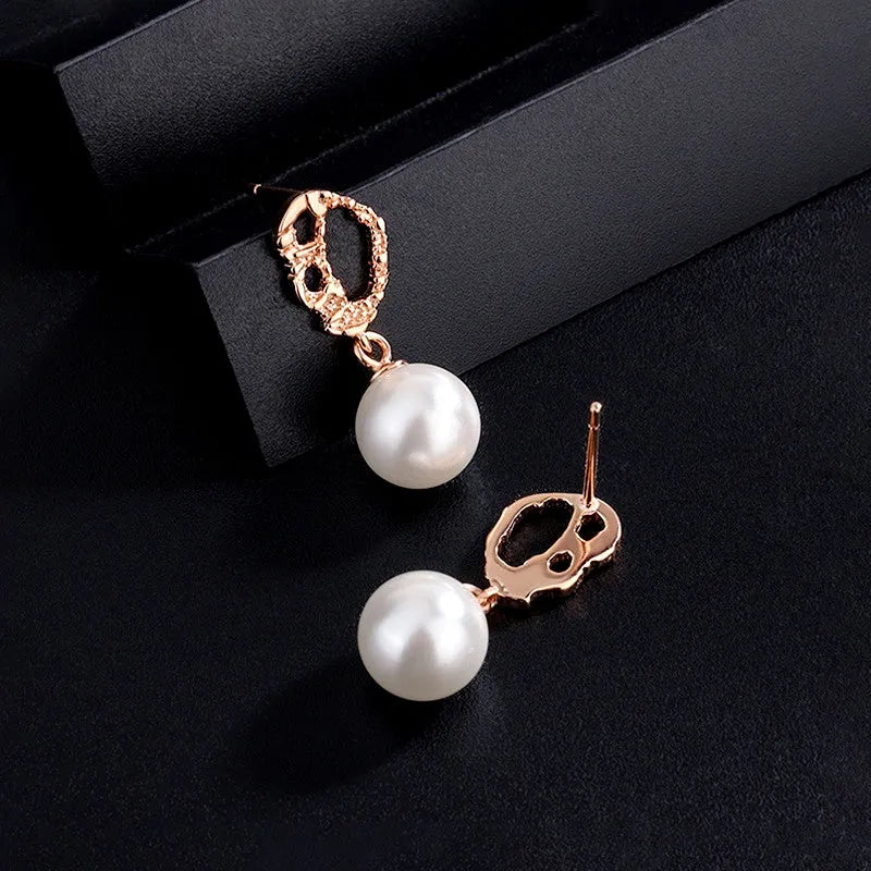 Close-up detail of the sparkling zircons and plating on the Pearl Earrings