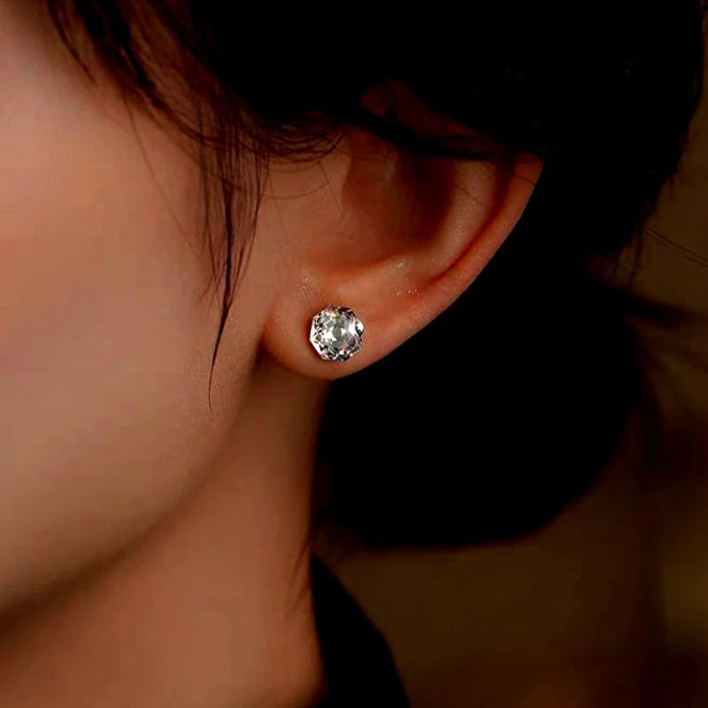 Angled view of the Sterling Silver Colorful Diamond Stud Earrings