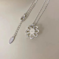 Detailed view of the Sterling Silver Contrast Daisy Necklace chain and pendant