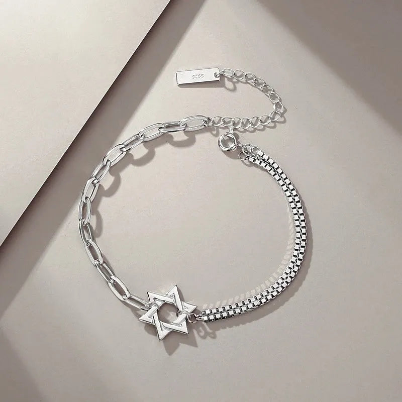 Close-up of the clasp and charm details on the Couple Bracelets