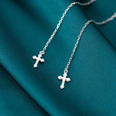 Close-up detail of the sparkling zircons and plating on the Cross Threader Earrings