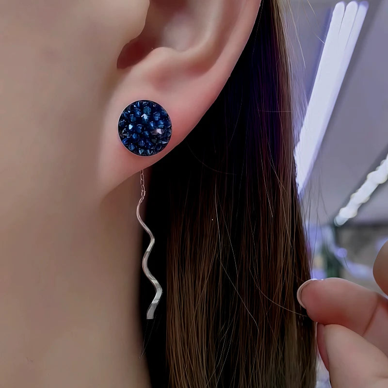 Angled view of the Sterling Silver Crystal Wavy Line Threader Earrings