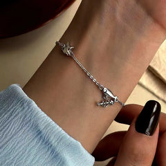 Close-up of the clasp and charm details on the Cat Fish Bracelet