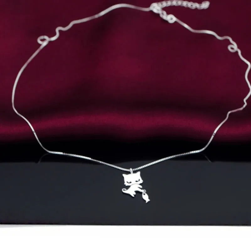 Sterling Silver Cute Kitten And Fish Necklace worn to showcase its length and pendant detail