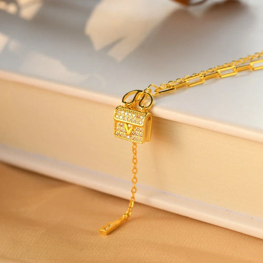 Sterling Silver Diamond-Studded Bag Necklace worn to showcase its length and pendant detail