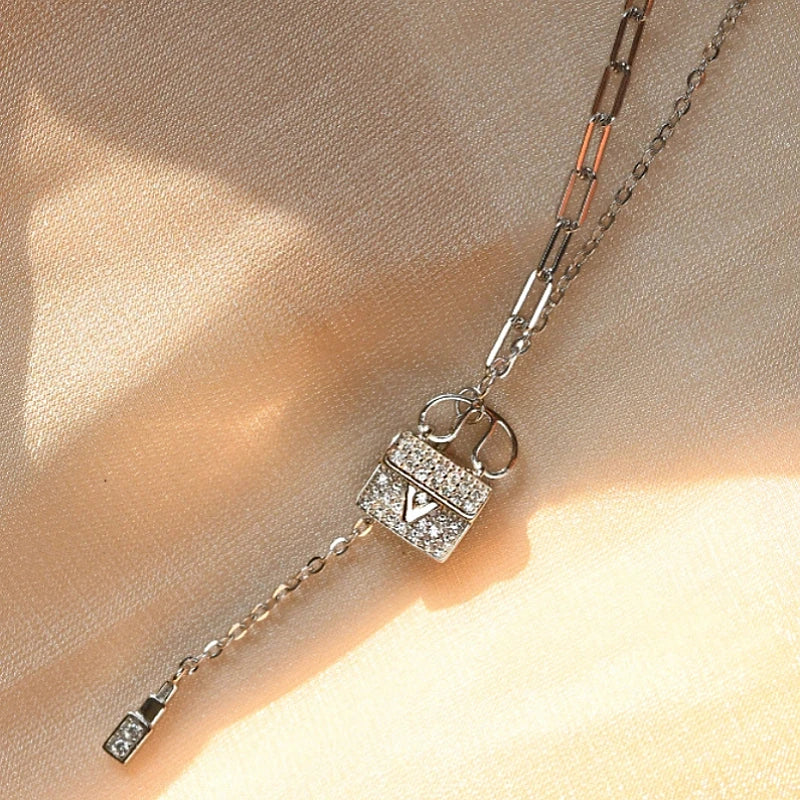 Detailed view of the Sterling Silver Diamond-Studded Bag Necklace chain and pendant