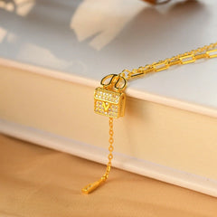 Sterling Silver Diamond-Studded Bag Necklace worn to showcase its length and pendant detail