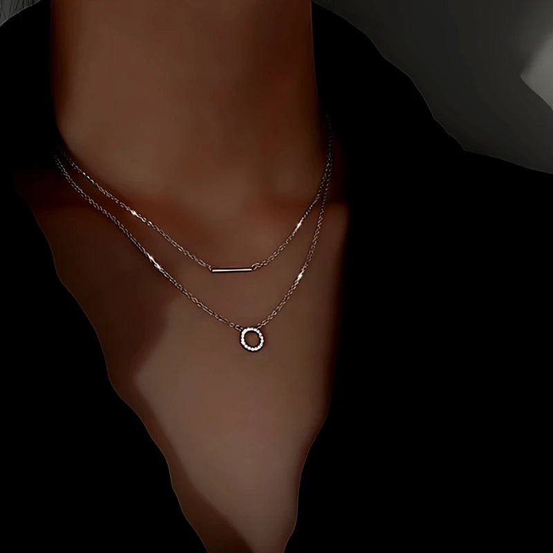 Detailed view of the Sterling Silver Diamond-Studded Double-Layer Necklaces chain and pendant