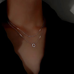 Detailed view of the Sterling Silver Diamond-Studded Double-Layer Necklaces chain and pendant