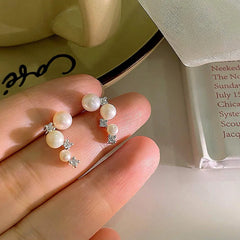 Close-up detail of the sparkling zircons and plating on the Diamond & Pearl Studs